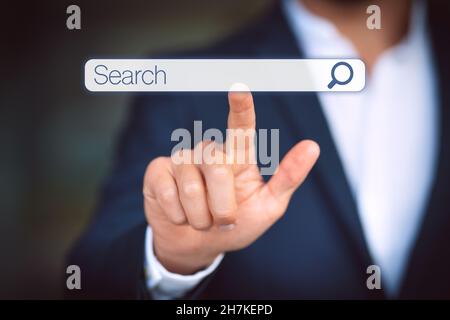 Businessman clicking internet search bar. Online search. Searching browsing internet data information. Networking concept Stock Photo