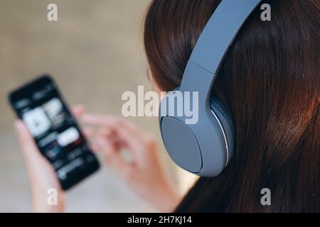 Young woman using smart phone. Stock Photo