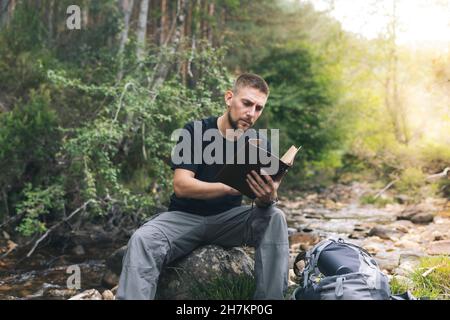 Young businesswoman playing with female colleague while wearing virtual reality simulator Stock Photo