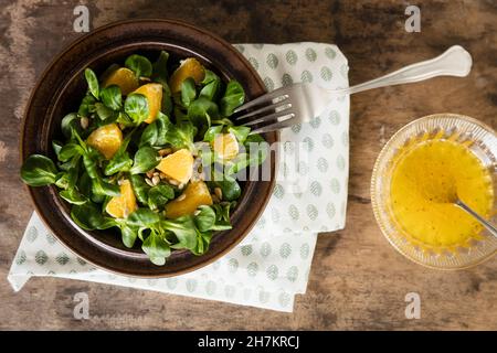 Hands of woman eating freshly baked apple pie on picnic blanket Stock Photo