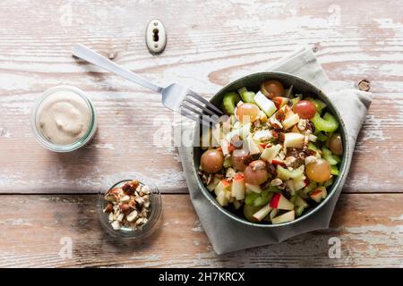 Bowl of beetroot salad with pieces of orange Stock Photo