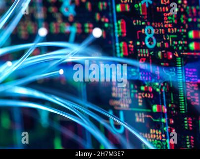 Fiber optics transferring data into circuit board Stock Photo