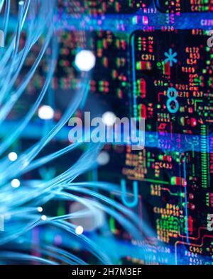 Fiber optics transferring data into circuit board Stock Photo