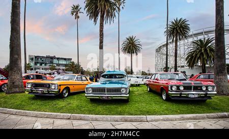 Group of classic cars, holden, and ford parked in the grass during a car show exhibition. Melbourne, Australia, St Kilda, Luna Park. September 2nd. Stock Photo