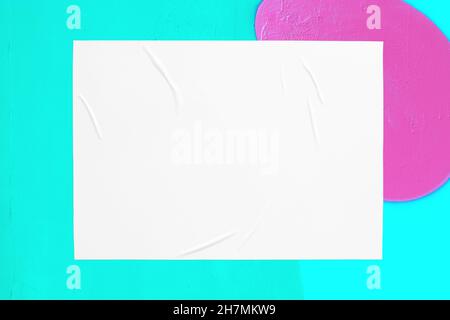 colorful urban wall with wrinkled glued poster template Stock Photo