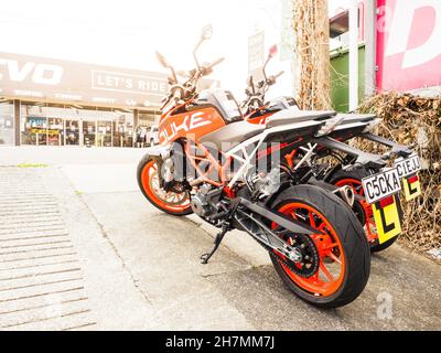 AUCKLAND, NEW ZEALAND - Nov 24, 2021: View of learners KTM Duke 390 bikes parked in driveway. Auckland, New Zealand - November 22 2021 Stock Photo