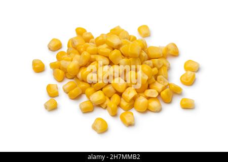 Heap of yellow cooked sweet corn kernels isolated on white background close up Stock Photo