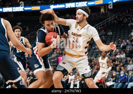 Gonzaga Bulldogs forward Anton Watson (22) and Central Michigan Chippewas forward Caleb Hodgson (34) fight for a loose ball during a NCAA basketball g Stock Photo