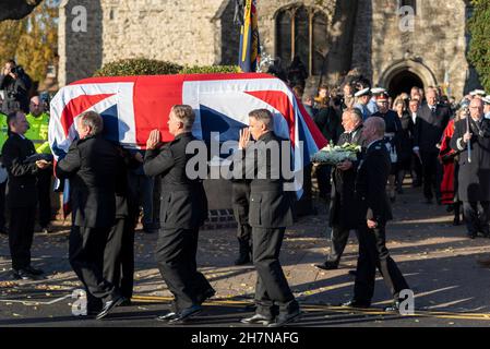 The casket of murdered MP Sir David Amess, draped in a Union Jack flag, being carried from St. Mary's Church, Southend, following a funeral service Stock Photo