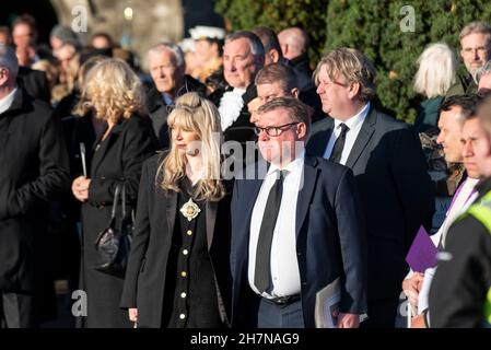 Mourners outside St. Mary's Church in Southend, following the funeral service for MP David Amess, including MP Mark Francois and Olivia Sanders Stock Photo