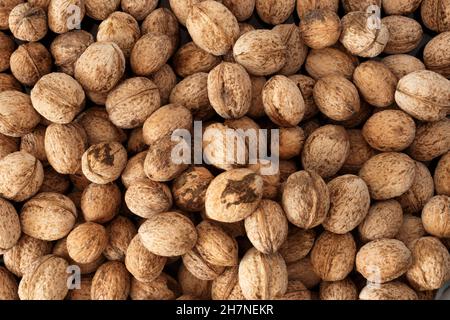 Top view photo of dried shelled walnuts as a background. Stock Photo