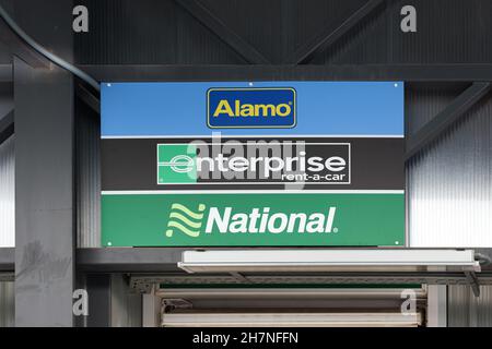 VALENCIA, SPAIN - NOVEMBER 23, 2021: Enterprise, National and Alamo are American car rental companies Stock Photo