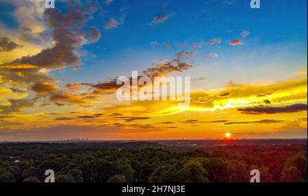 Glowing sunset with the Atlanta and Buckhead skyline on the horizon Stock Photo