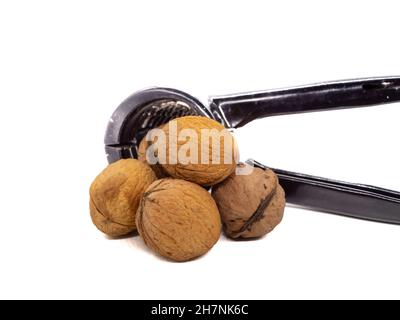 Nutcracker with walnuts isolated on a white background Stock Photo