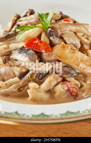Stew with four types of mushrooms. French gourmet cuisine. Close up Stock Photo