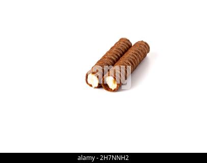 Brown wafer roll isolated on white background. Broken Chocolate wafer roll stick. Close up Stock Photo
