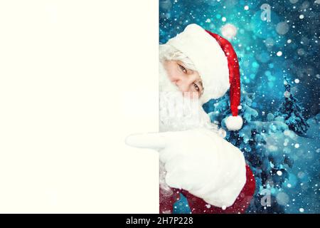Authentic Santa Claus with poster on white background Stock Photo - Alamy