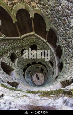 Sintra, Portugal - 28.10.2018: The Initiation well of Quinta da Regaleira in Sintra, Portugal. It's a 27 meter staircase that leads straight down unde Stock Photo