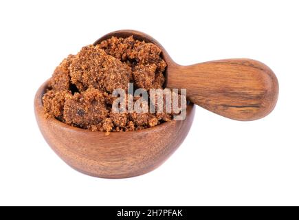 Dark muscovado sugar or Barbados sugar in wooden spoon isolated on white  background Stock Photo - Alamy