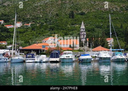 DUBROVNIK, CROATIA - JULY 18, 2021: Sailboats moored in Dubrovnik ACI Marina in Dalmatia. Croatia is a famous summer sailing destination in Europe. Stock Photo