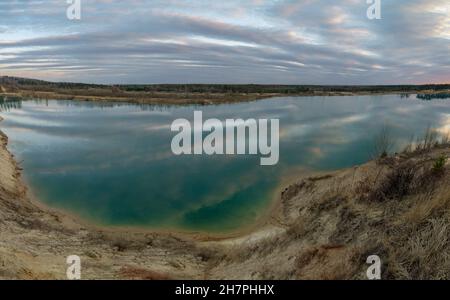 Beautiful turquoise color of the water in the quarry . Vsevolozhsk. Leningrad region. Stock Photo