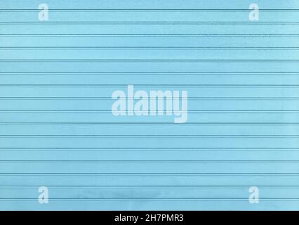 Background of pastel blue painted horizontal metal window roller shutter blinds, wood textured Stock Photo