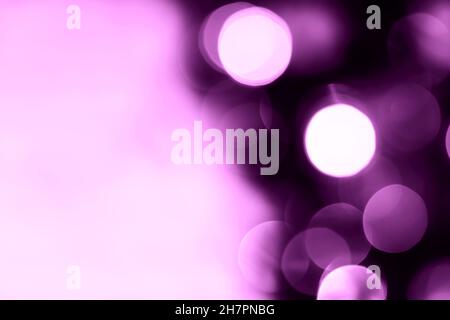 Blurred lights violet purple background. Abstract bokeh with soft light. Trendy color Stock Photo