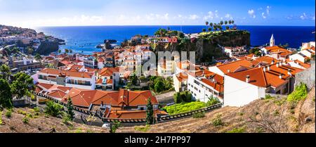 Charming traditional fishing village Camara de Lobos. Madeira island travel and landmarks. Portugal Stock Photo