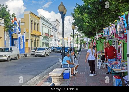 Street scene showing Spanish colonial houses and market stalls selling toys in the city Ponce, southern Puerto Rico, Greater Antilles, Caribbean Stock Photo