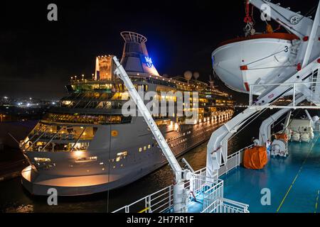 RCI cruise ship seen from ferry boat Kydon docked in the port / harbour of San Juan in Puerto Rico at night, Greater Antilles, Caribbean Sea Stock Photo