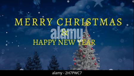 Merry christmas and new year wishes text on decorated tree against sky with snowflakes and stars Stock Photo