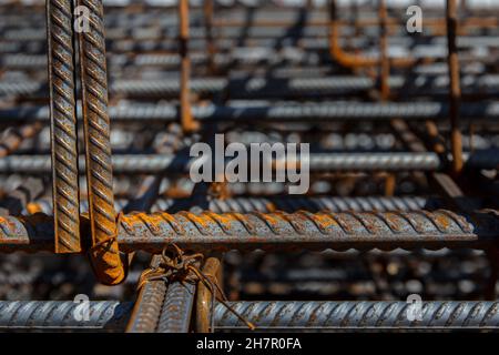 Stacked steel rods for concreting. Preparation of the base for the concrete slab. Stock Photo