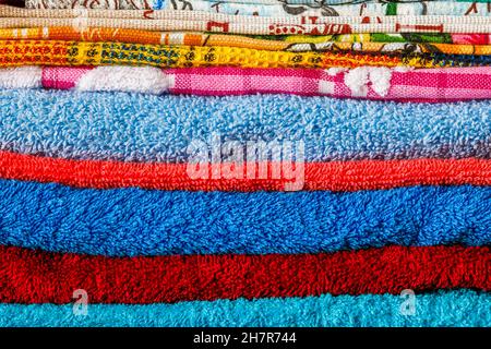 stack of colored towels full frame close-up background Stock Photo
