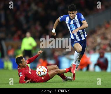 Liverpool, England, 24th November 2021. Thiago Alcantara of Liverpool tackles Luis Diaz of FC Porto  during the UEFA Champions League match at Anfield, Liverpool. Picture credit should read: Darren Staples / Sportimage Credit: Sportimage/Alamy Live News Stock Photo