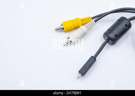 Closeup shot of a yellow and white cable jack isolated on white background Stock Photo