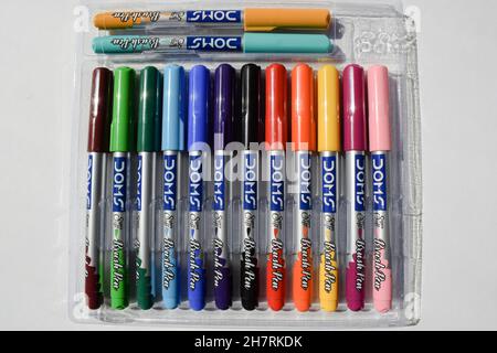 Doms brand Colored Brush pens pack of 14 pens in transparent packet. Watercolor Brush pens colorful art supplies. Stock Photo