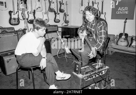 Irish blues/rock guitarist and singer Rory Gallagher trying out new equipment at Nomis Studios in West London, England on 11 July 1989. Stock Photo