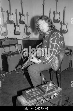 Irish blues/rock guitarist and singer Rory Gallagher trying out new equipment at Nomis Studios in West London, England on 11 July 1989. Stock Photo