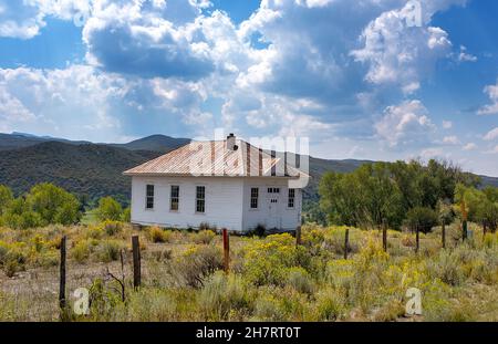 September 2, 2021: An early school house found along the Great Divide Mountain Bike Route, near the Colorado/Wyoming border.Spanning 3,084 miles from Jasper National Park, Alberta, to the Mexico border, the Great Divide Mountain Bike Route is the longest off-pavement cycling route in the world. Stock Photo