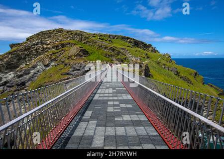 A view along the impressive bridge at Tintagel Castle in Cornwall, UK. Stock Photo