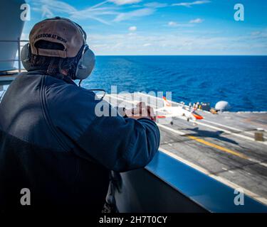 Boatswain s Mate Seaman Alleice Semien stands watch on vulture s