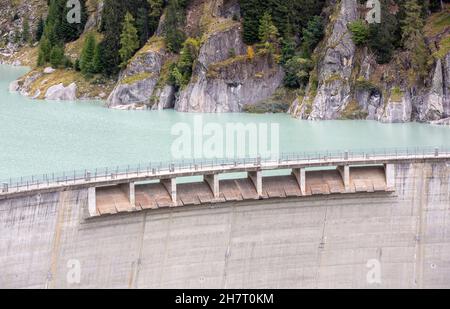 GIBIDUM DAM, NATERS, SWITZERLAND - September 27, 2020: Renewable energy. View on the hydro electric power dam in the mountains of Wallis. Stock Photo