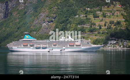 Cruise ship Artania at anchor, Phoenix Reisen, German travel agency, cruises operator, Geiranger Fjord mountains, Norway, Cruises tourism image photo Stock Photo