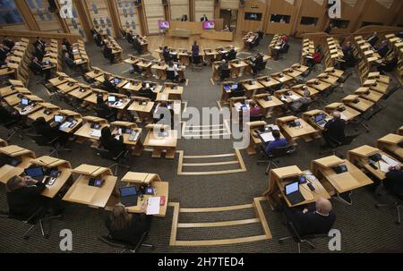 File photo dated 16/11/21 of First Minister Nicola Sturgeon in the debating chamber of the Scottish Parliament in Edinburgh. A one-minute silence will be held at the Scottish Parliament for all women killed by men this year. The event has been organised on the 30th anniversary of the UN's global campaign 16 Days of Activism against Gender-Based Violence, which runs from November 25 to December 10. Stock Photo