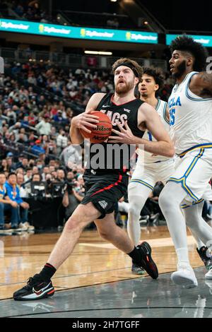 Gonzaga Bulldogs forward Drew Timme (2) drives to the basket against UCLA Bruins center Myles Johnson (15) during a NCAA basketball game, Tuesday, Nov Stock Photo