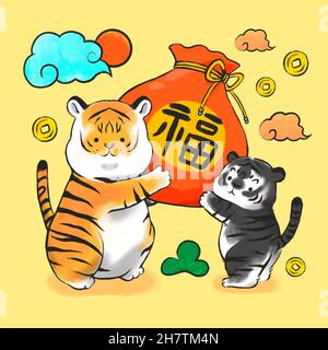 2022 year of tiger, two tigers with lucky bag Stock Photo