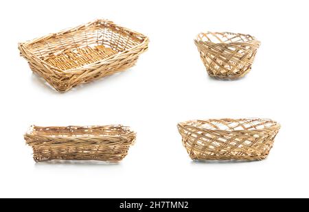 Empty wicker basket isolated on white background. Stock Photo