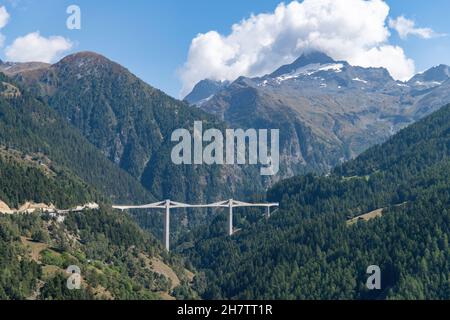 Panoramic view on the Ganter Bridge with geometric profile, near Brig, Switzerland, spanning Ganter River valley along Simplon Pass road Stock Photo