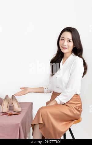 Asian Korean woman shopping host, live commerce sale show concept Stock Photo