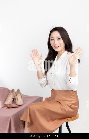 Asian Korean woman shopping host, live commerce sale show concept Stock Photo